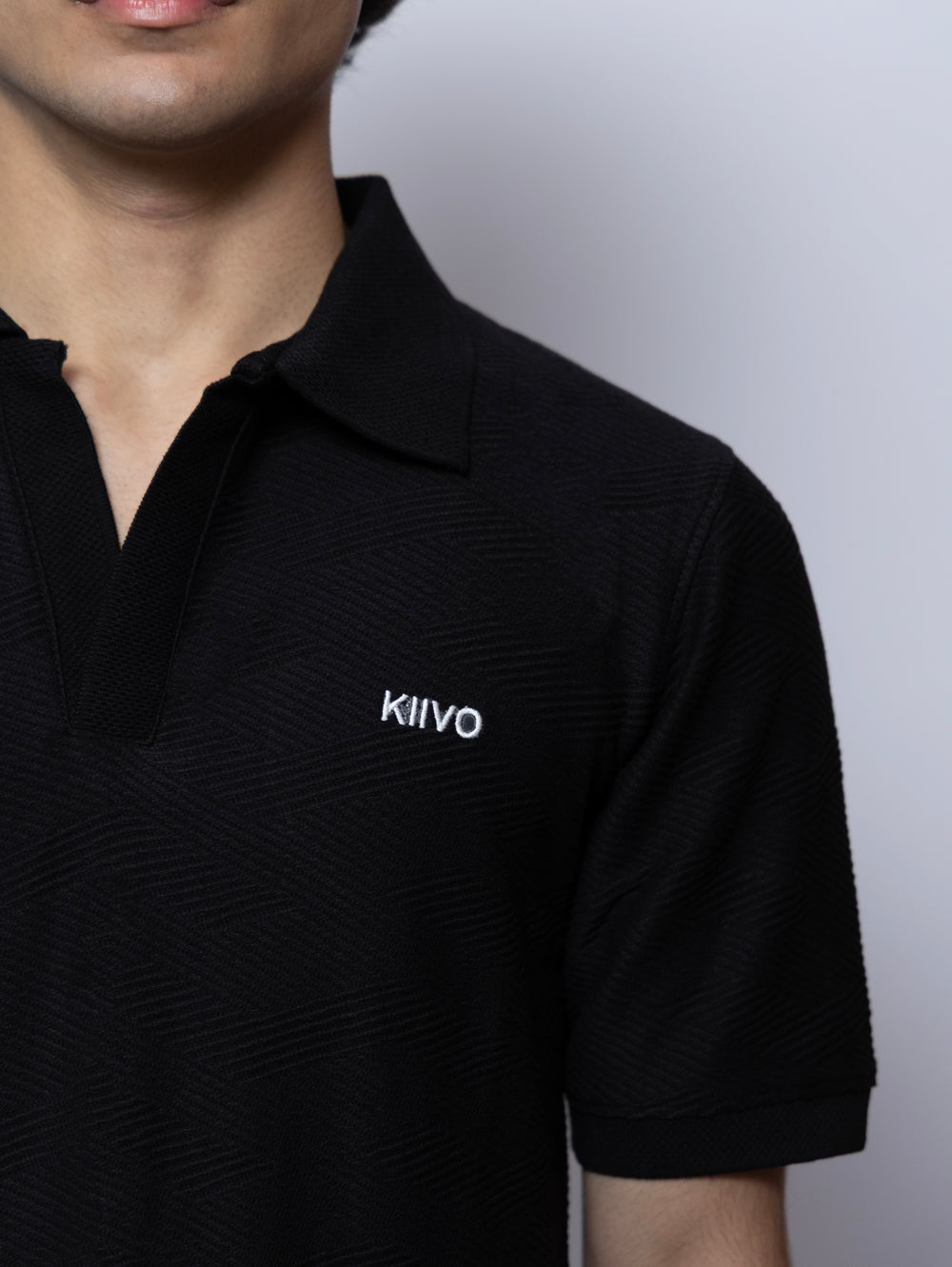 BLACK TEXTURED KNITTED POLO